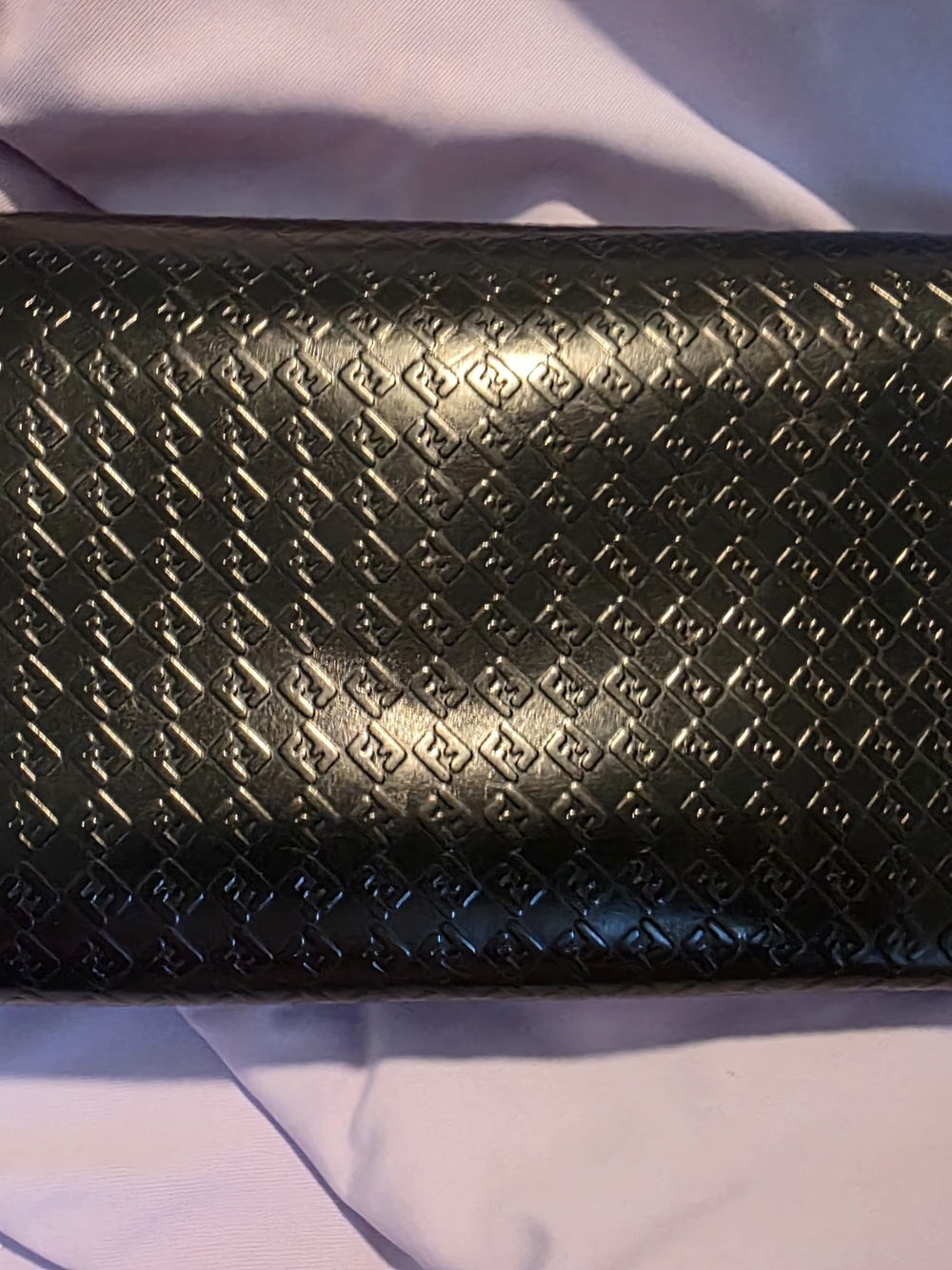 Womens Black Fendi long bifold wallet with embossed FF monogram and snap closure